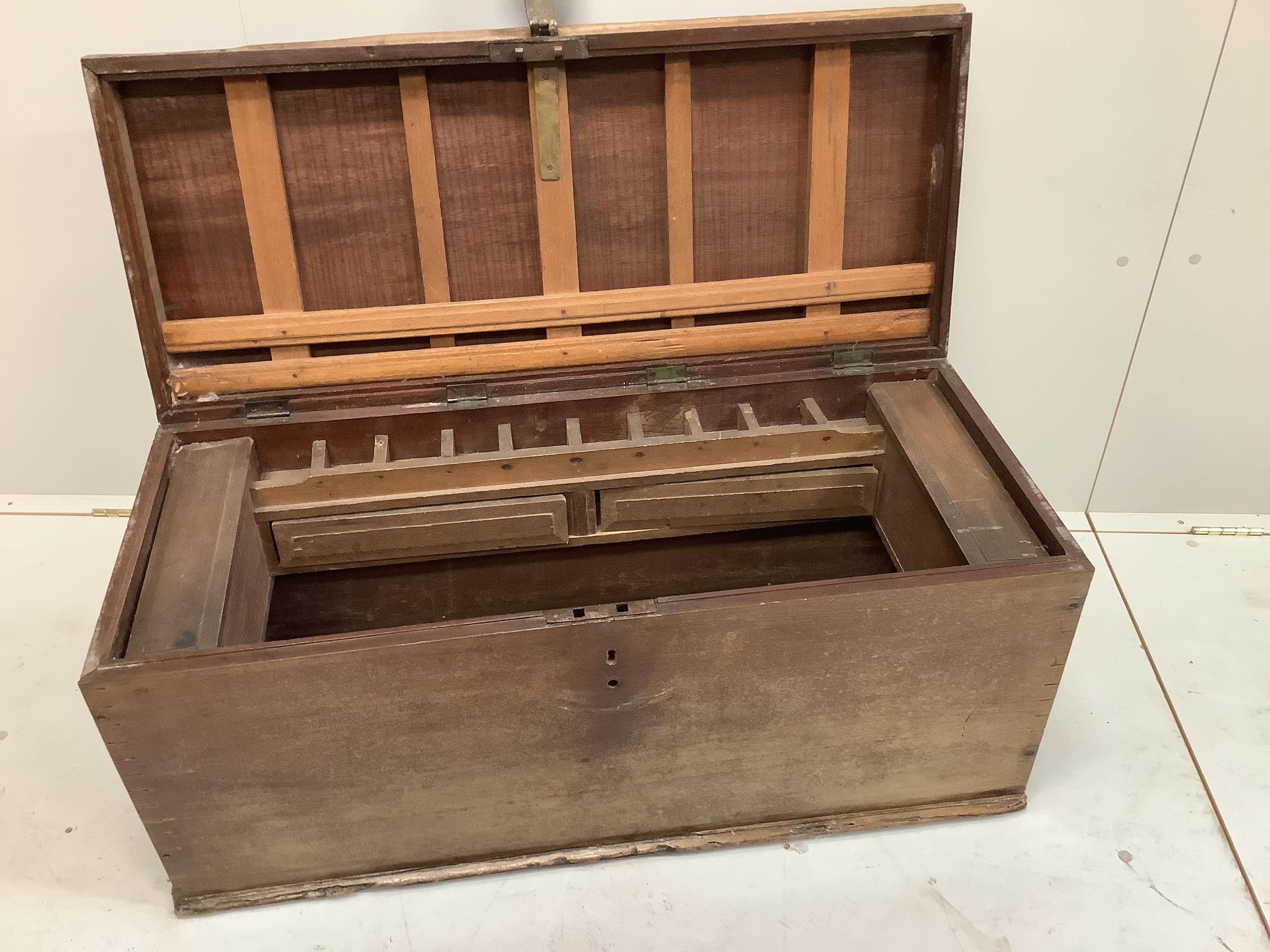 A 19th century rectangular mahogany trunk, width 104cm, depth 43cm, height 46cm